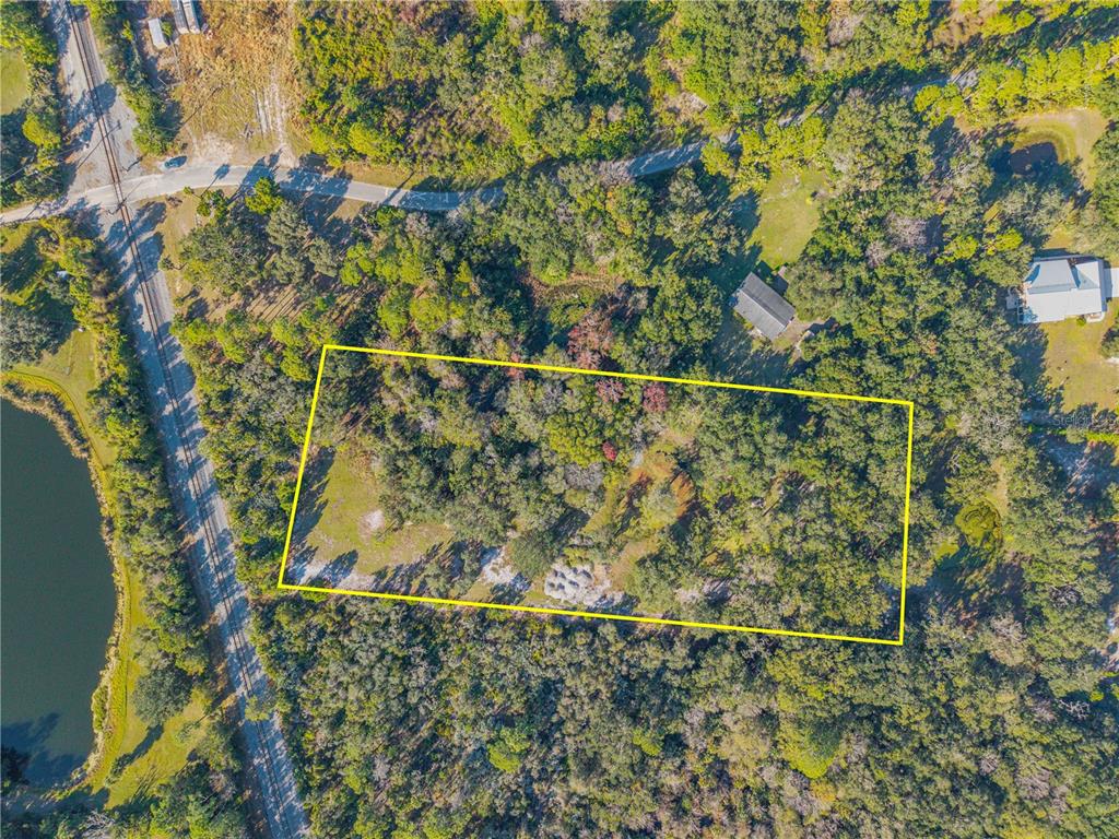 480 Clinton Cemetery Road Edgewater, FL 32141 - Photo 2 of 29 a view of a dry yard