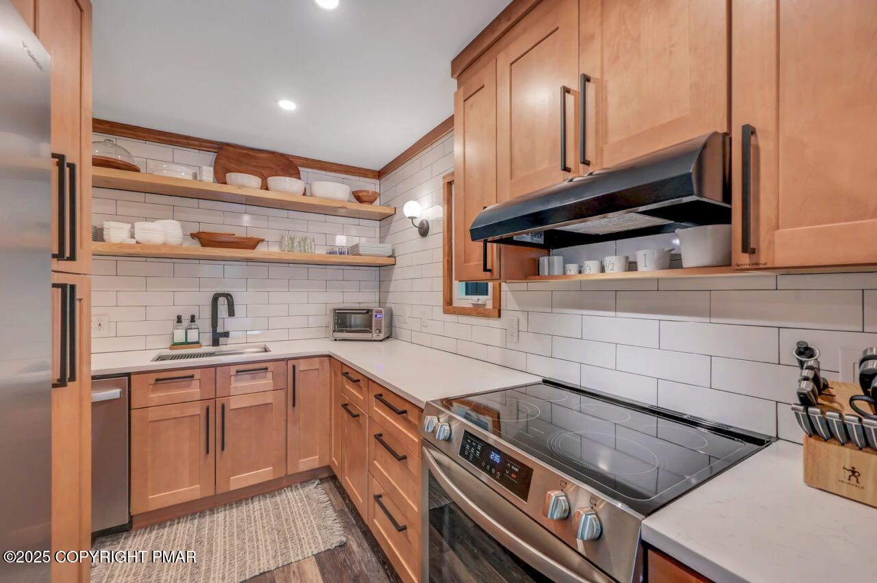 1169 Deer Trail Road Pocono Pines, PA 18350 - Photo 8 of 21 a kitchen with a stove and a sink