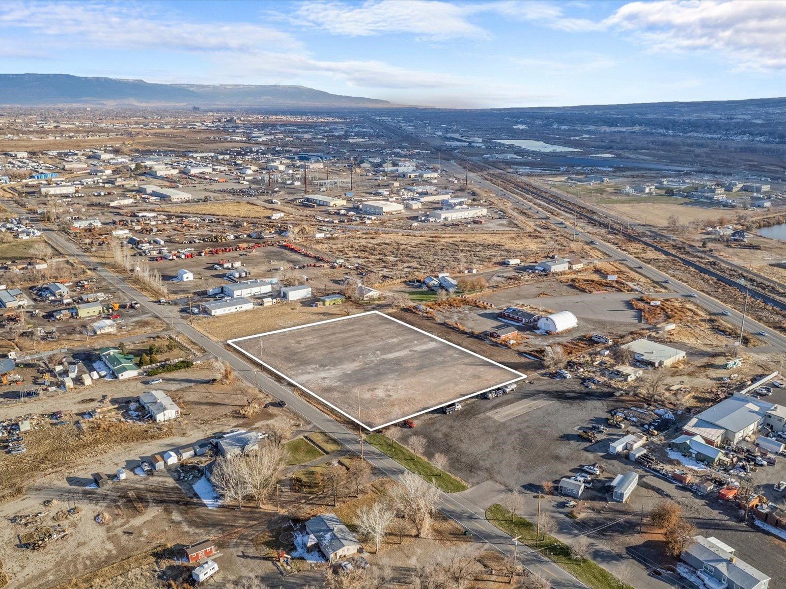 an aerial view of residential building with ocean view