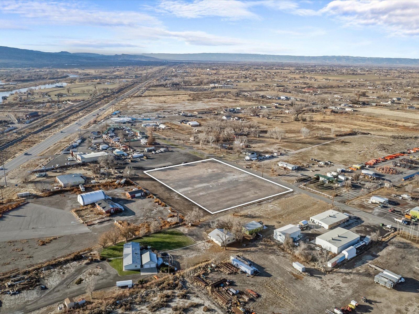 2119 H Road Grand Junction, CO 81505 - Photo 2 of 9 an aerial view of a city