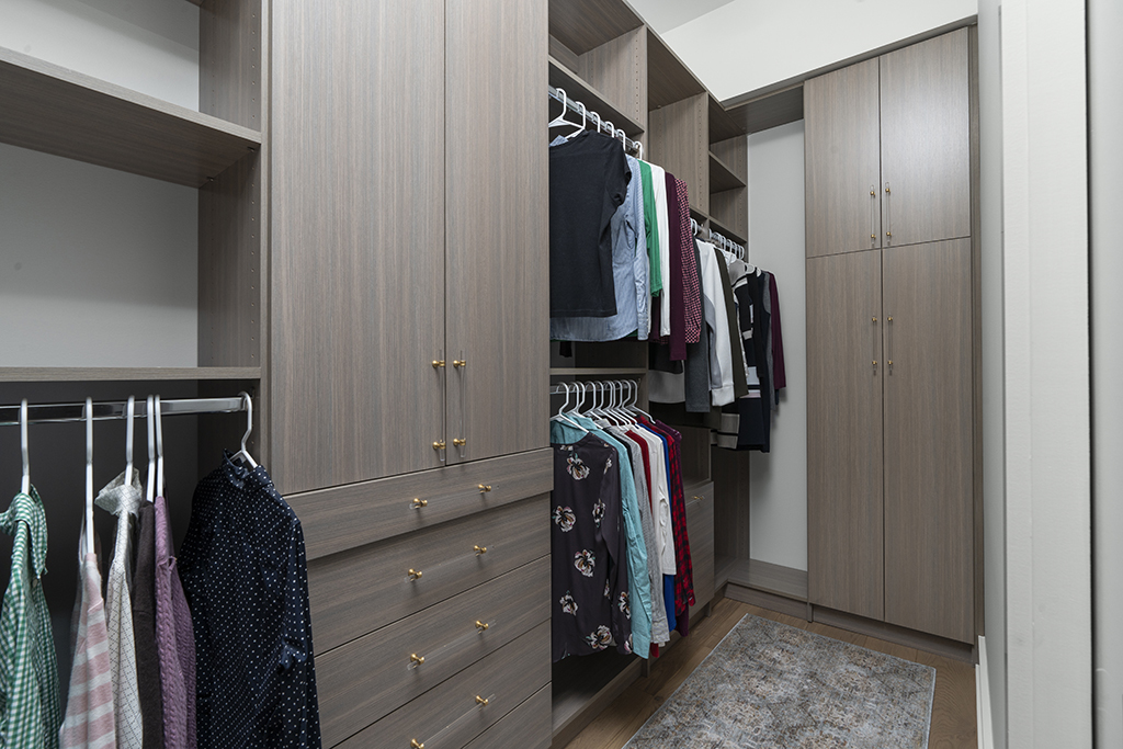 1132 West Adams Street, Unit 5W Chicago, IL 60607 - Photo 22 of 26 a view of walk in closet with clothes