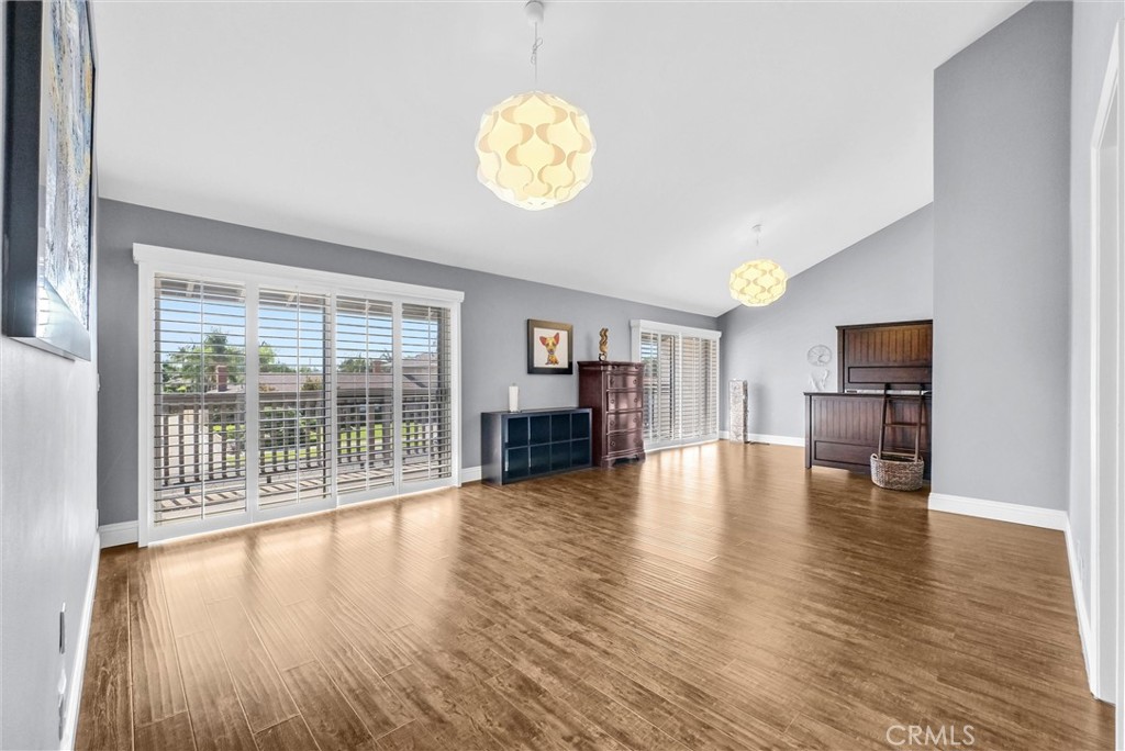 1417 West James Way Anaheim, CA 92801 - Photo 21 of 40 a view of empty room with wooden floor and fan