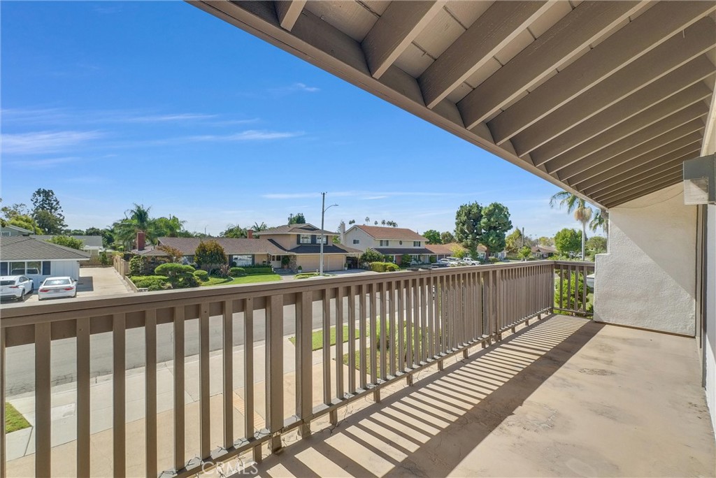 1417 West James Way Anaheim, CA 92801 - Photo 23 of 40 a balcony with wooden floor and city view