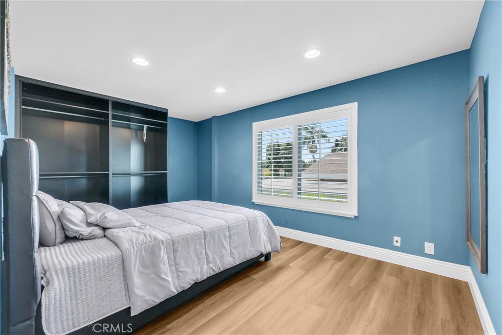 1417 West James Way Anaheim, CA 92801 - Photo 25 of 40 a bedroom with a bed and a window