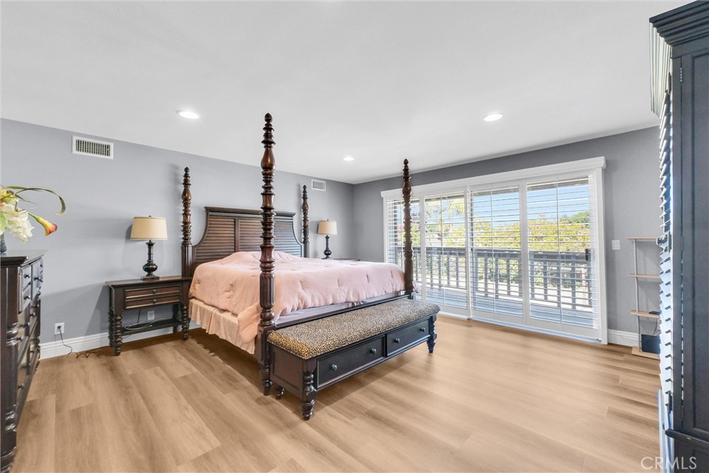 1417 West James Way Anaheim, CA 92801 - Photo 29 of 40 a bed room with a bed and a large window