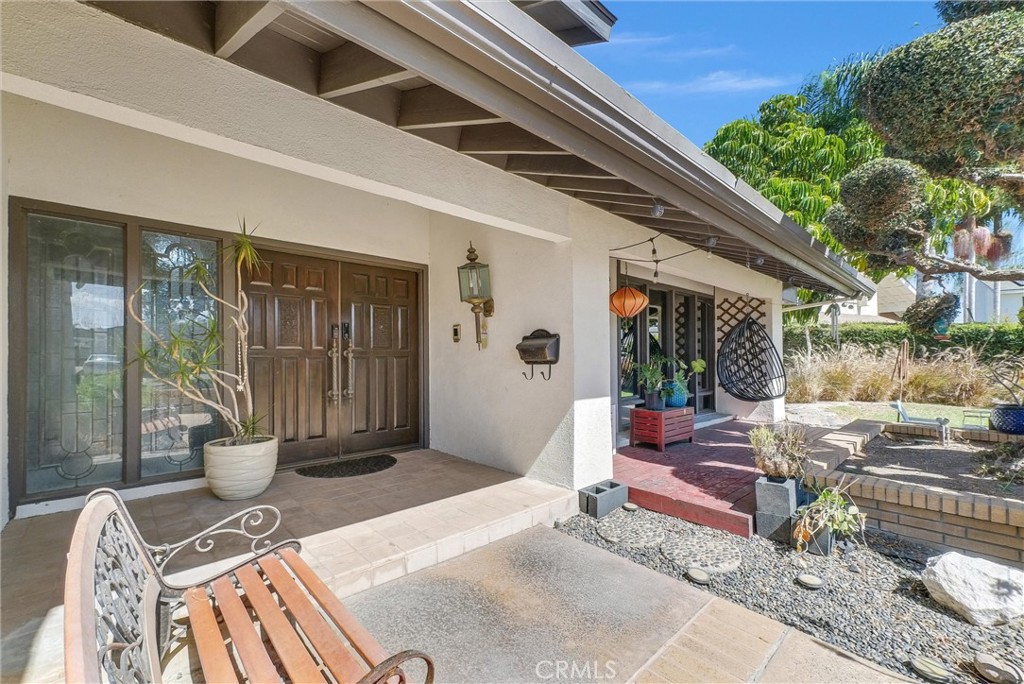 1417 West James Way Anaheim, CA 92801 - Photo 4 of 40 a view of a patio with couches table and chairs and potted plants