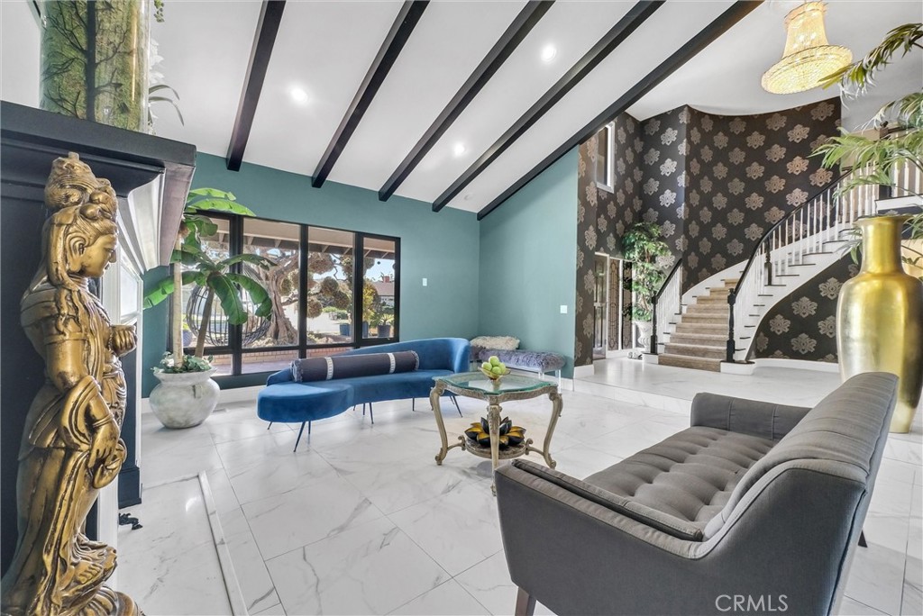 1417 West James Way Anaheim, CA 92801 - Photo 9 of 40 a living room with furniture and a large window