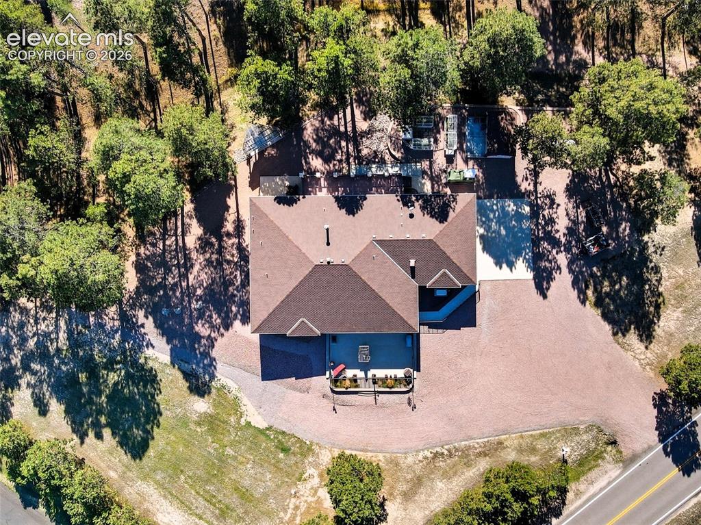12855 Murphy Road Elbert, CO 80106 - Photo 4 of 50 an aerial view of a house with outdoor space