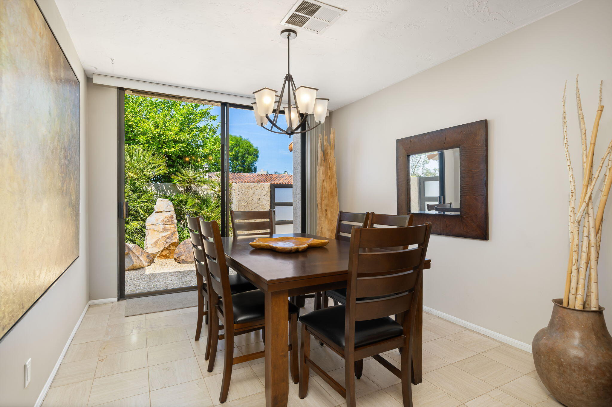 26 Stanford Drive Rancho Mirage, CA 92270 - Photo 14 of 39 a view of a dining room with furniture window and wooden floor