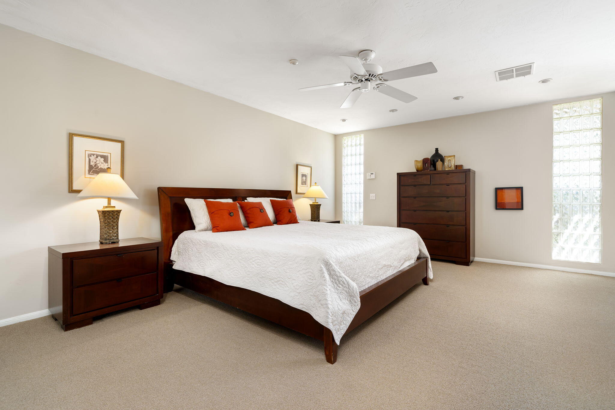 26 Stanford Drive Rancho Mirage, CA 92270 - Photo 15 of 39 a bedroom with bed and window