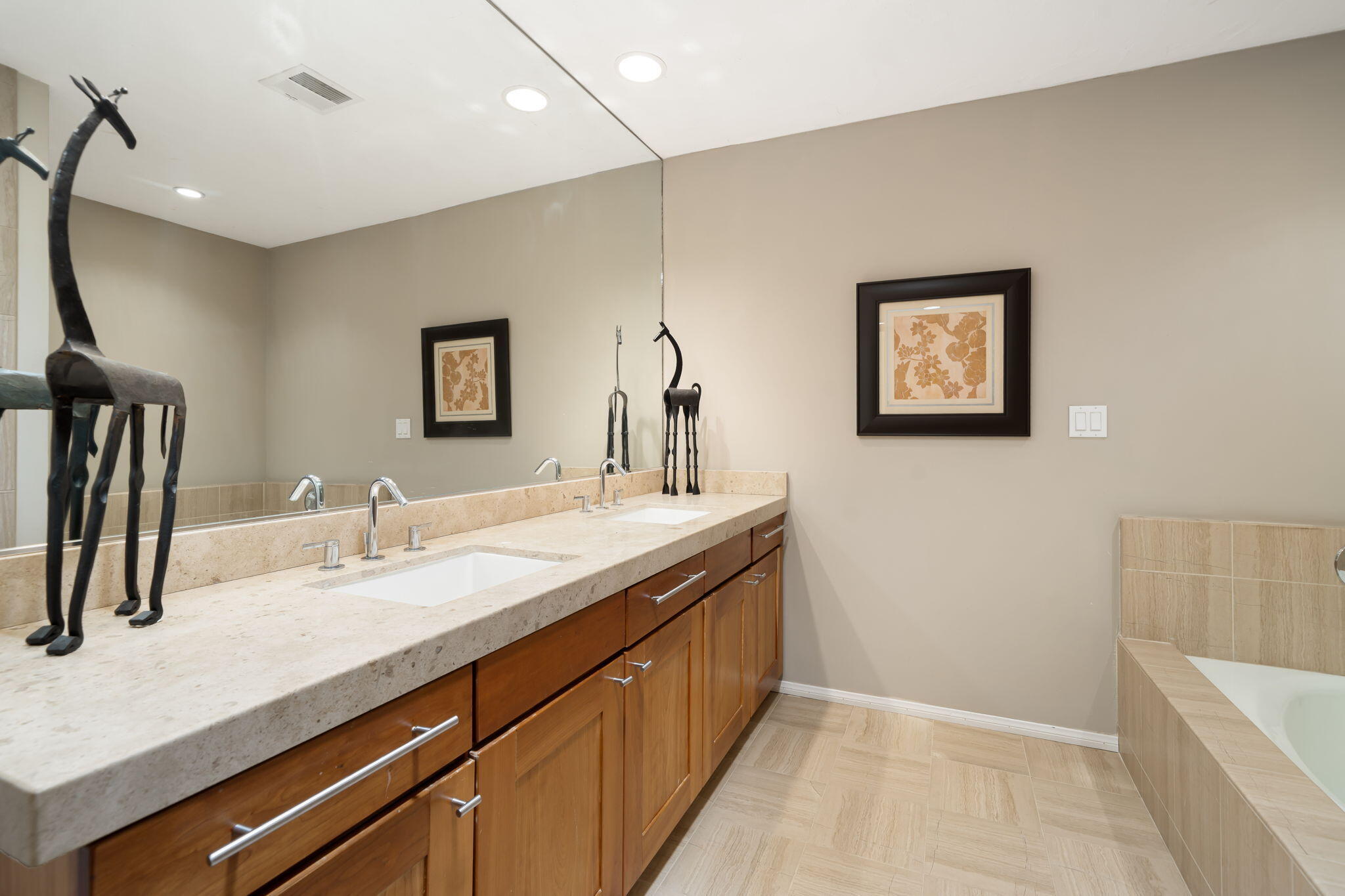 26 Stanford Drive Rancho Mirage, CA 92270 - Photo 20 of 39 a bathroom with a sink a vanity and a mirror