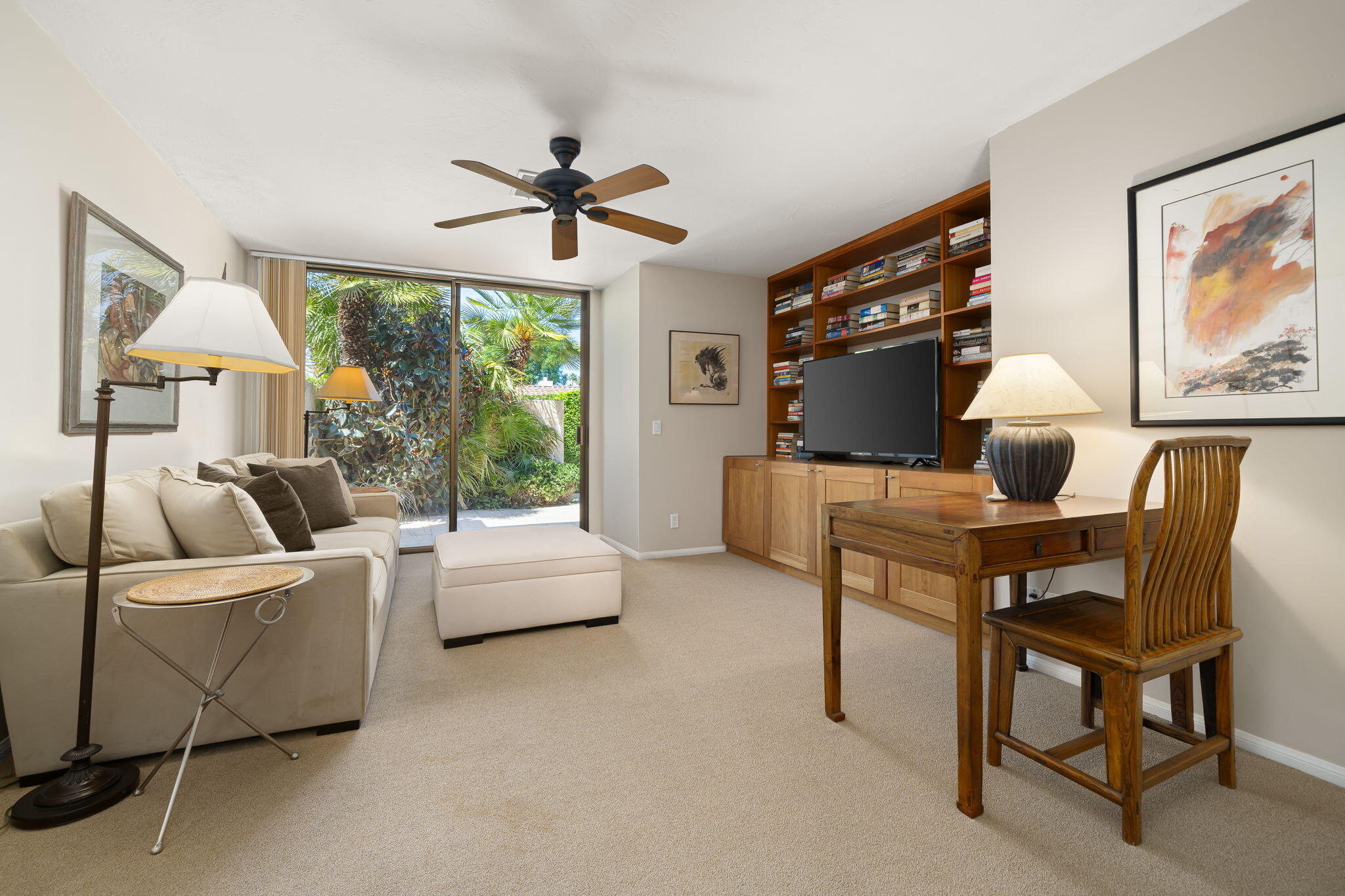 26 Stanford Drive Rancho Mirage, CA 92270 - Photo 22 of 39 a living room with furniture and a window