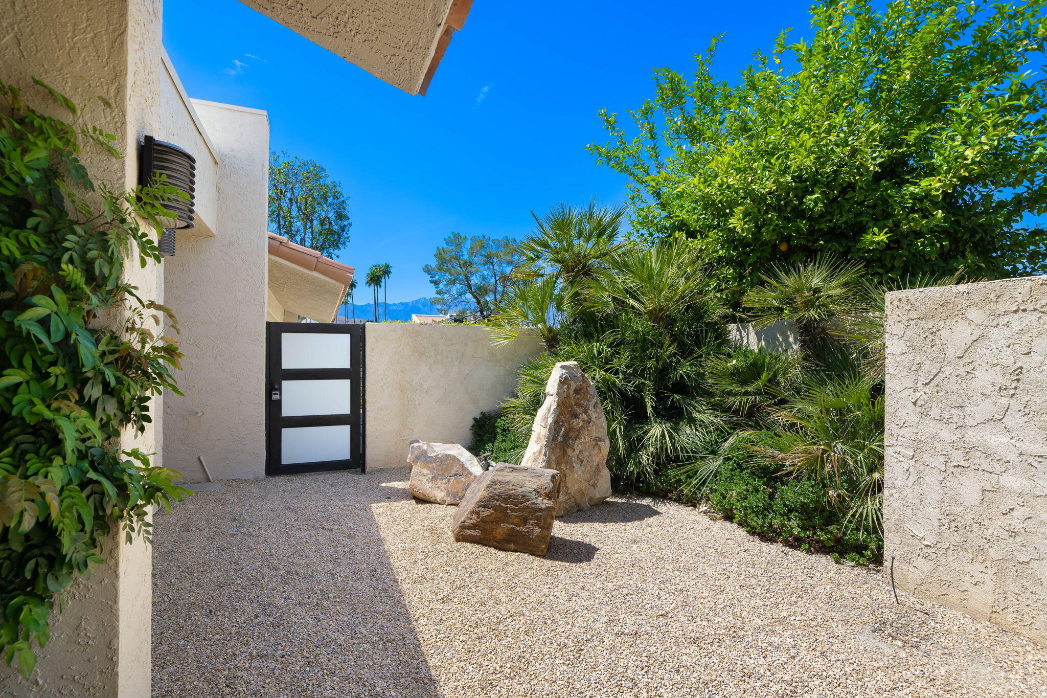 26 Stanford Drive Rancho Mirage, CA 92270 - Photo 30 of 39 a view of a outdoor space in front of a house
