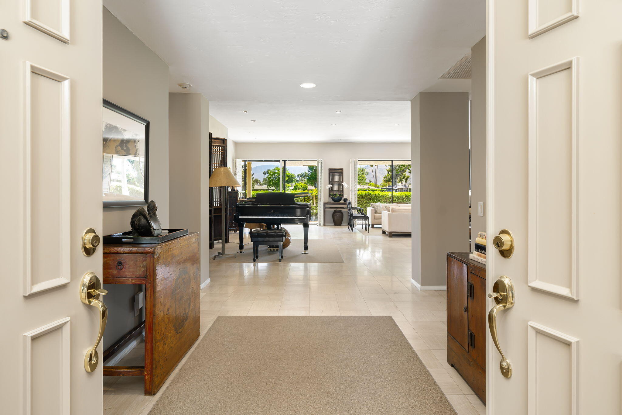 26 Stanford Drive Rancho Mirage, CA 92270 - Photo 4 of 39 a lobby with furniture and floor to ceiling window