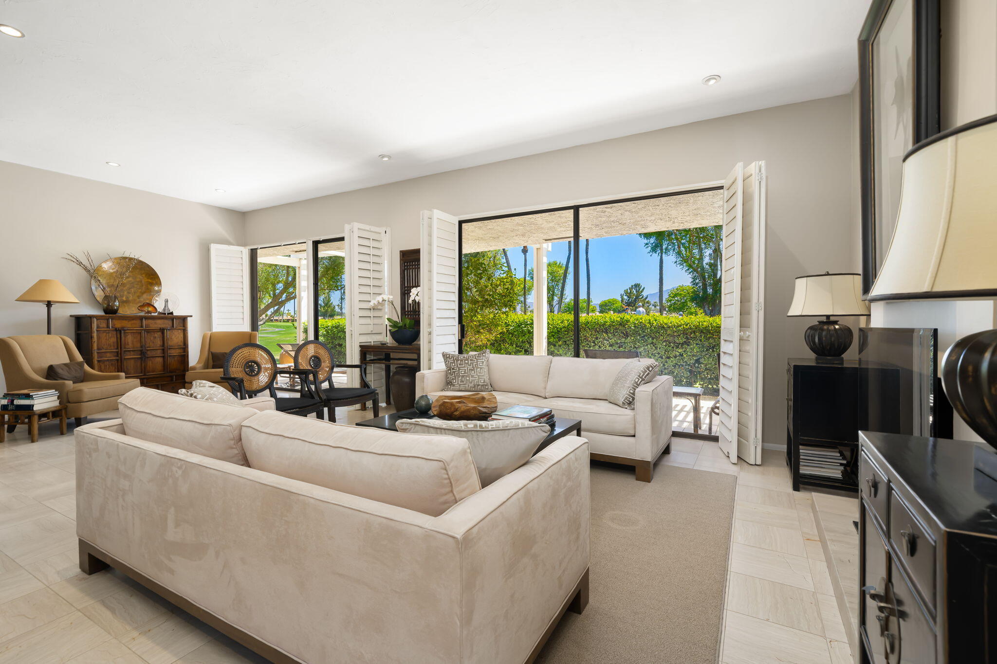 26 Stanford Drive Rancho Mirage, CA 92270 - Photo 5 of 39 a living room with furniture and a large window