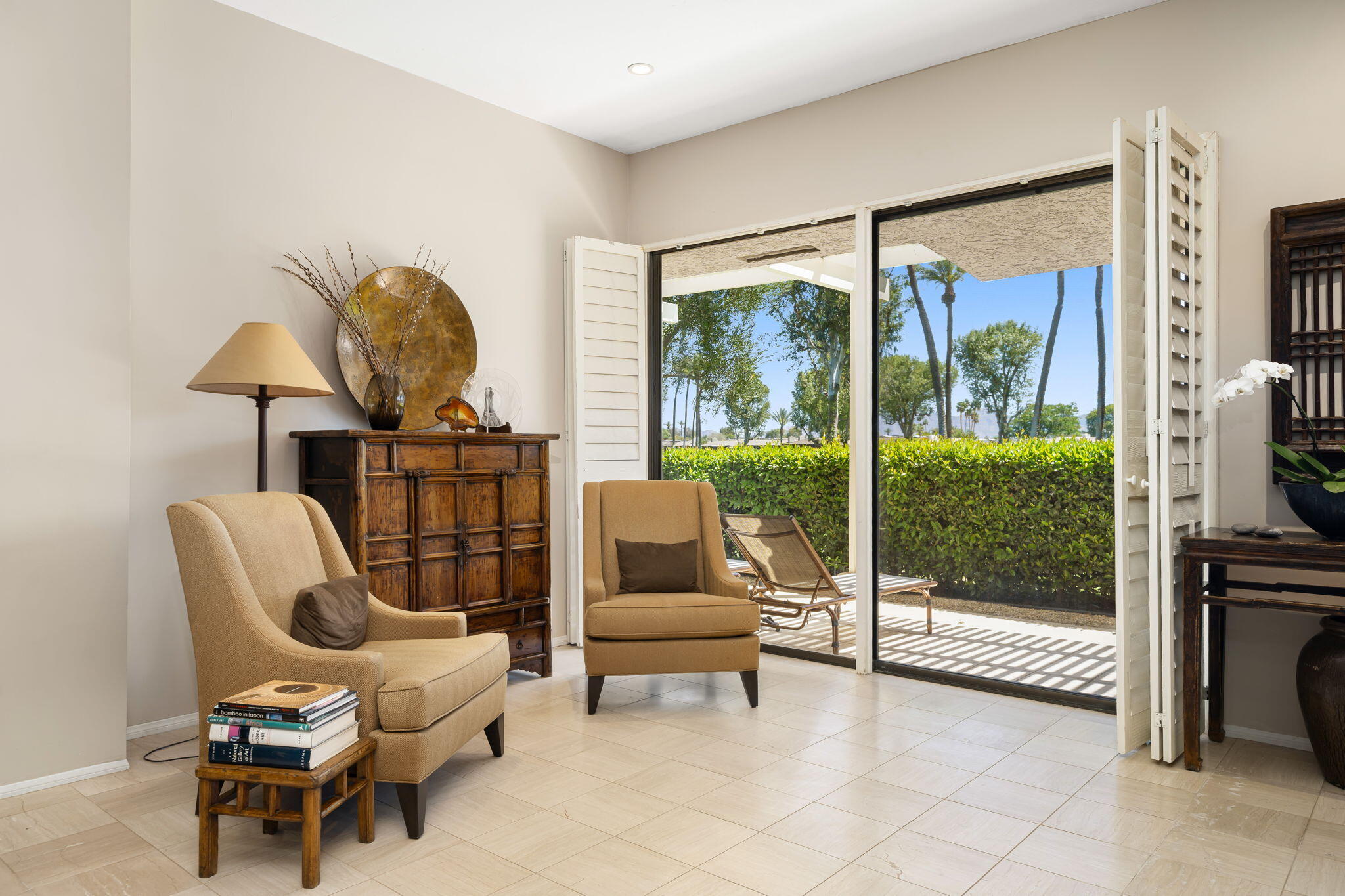 26 Stanford Drive Rancho Mirage, CA 92270 - Photo 7 of 39 a living room with furniture and a large window