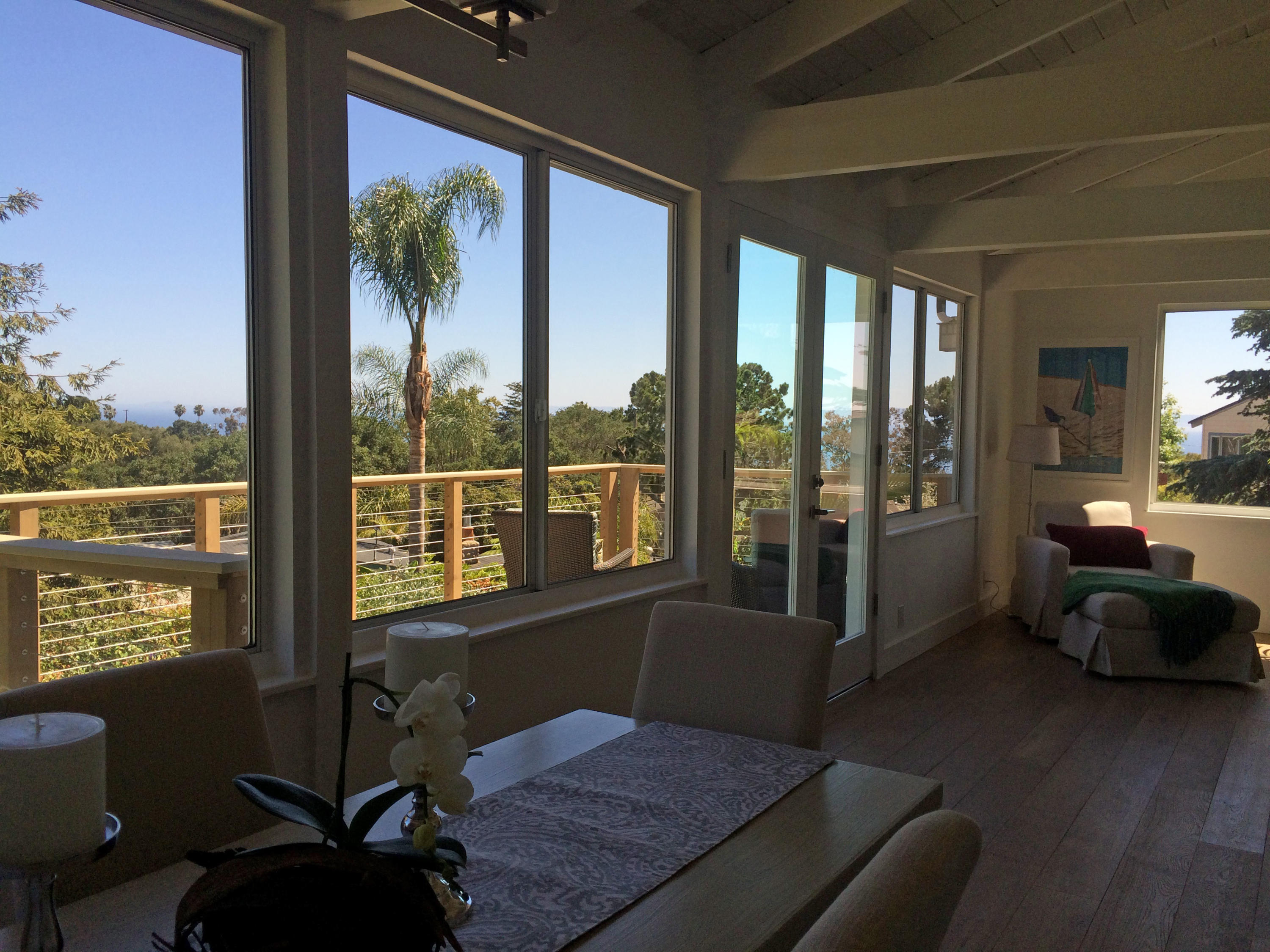 4 Fellowship Circle Santa Barbara, CA 93109 - Photo 8 of 27 a living room with furniture and a floor to ceiling window
