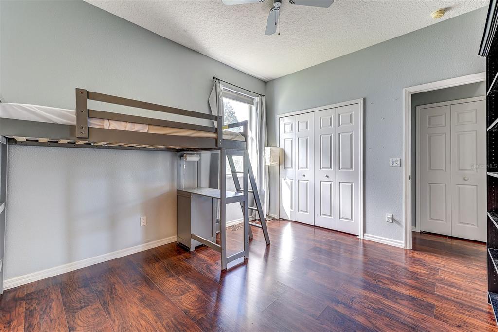 918 Algare Loop Windermere, FL 34786 - Photo 13 of 73 a view of empty room with wooden floor and fan