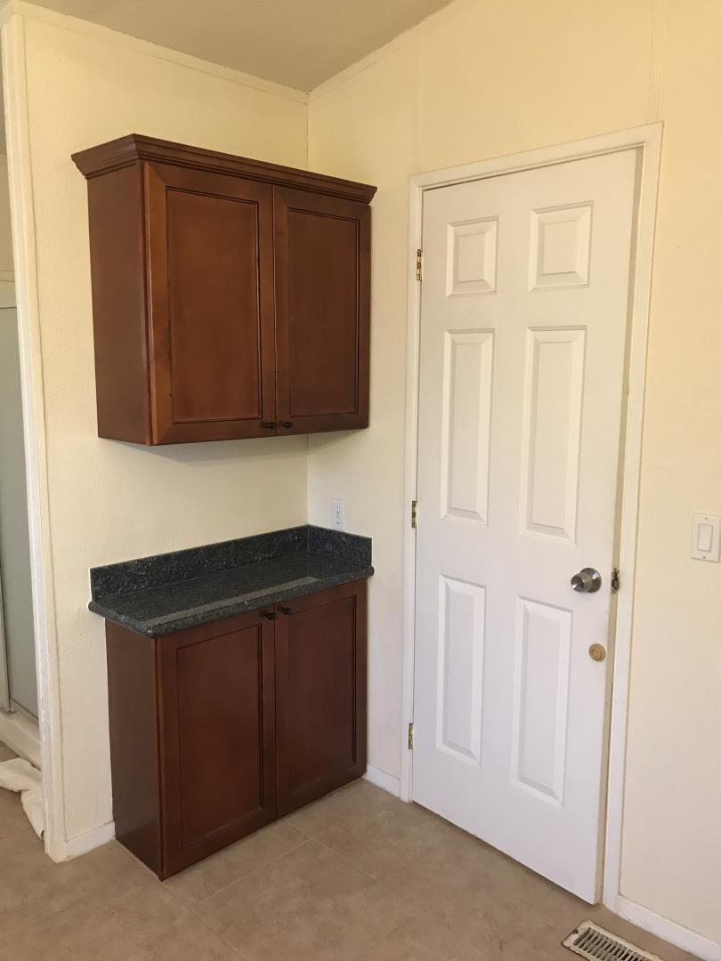 2151 Oakland Road, Unit 445 San Jose, CA 95131 - Photo 11 of 20 a view of an entryway with wooden cabinets