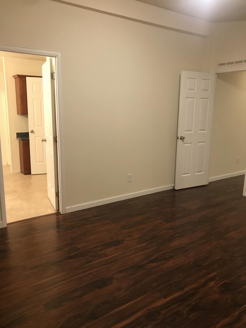 2151 Oakland Road, Unit 445 San Jose, CA 95131 - Photo 13 of 20 a view of a room with wooden floor and a window