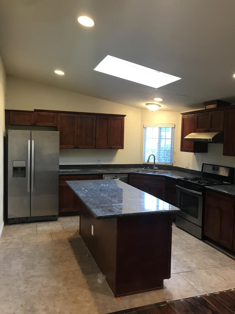 2151 Oakland Road, Unit 445 San Jose, CA 95131 - Photo 2 of 20 a kitchen with stainless steel appliances granite countertop a granite counter tops and a stove