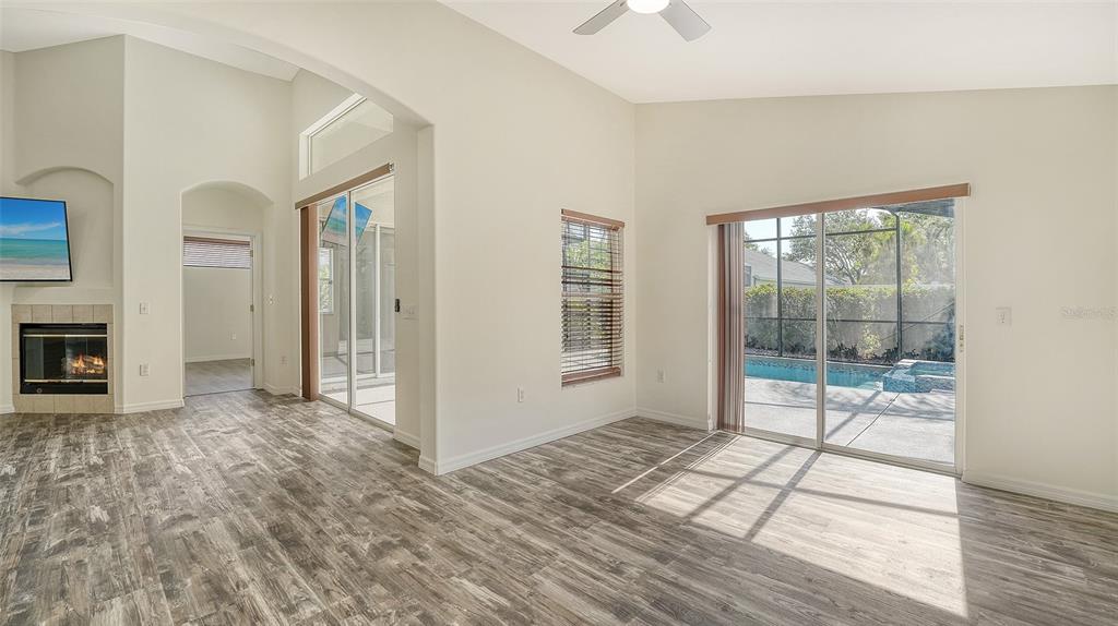 6213 Willet Court Lakewood Ranch, FL 34202 - Photo 17 of 74 a view of livingroom with furniture wooden floor and window
