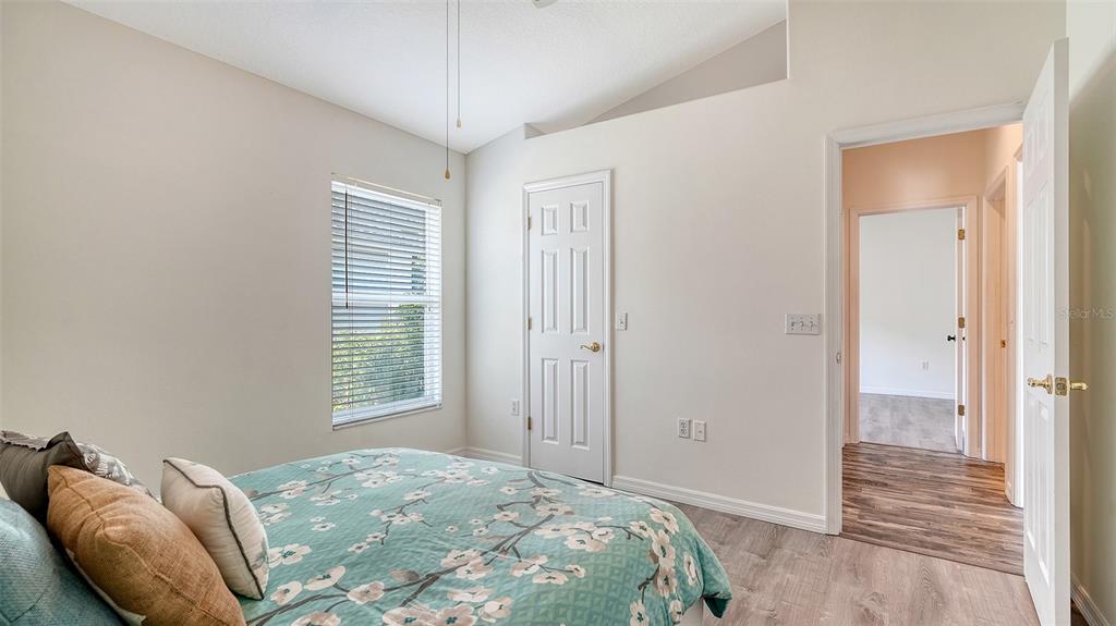 6213 Willet Court Lakewood Ranch, FL 34202 - Photo 28 of 74 a bedroom with a bed and a window