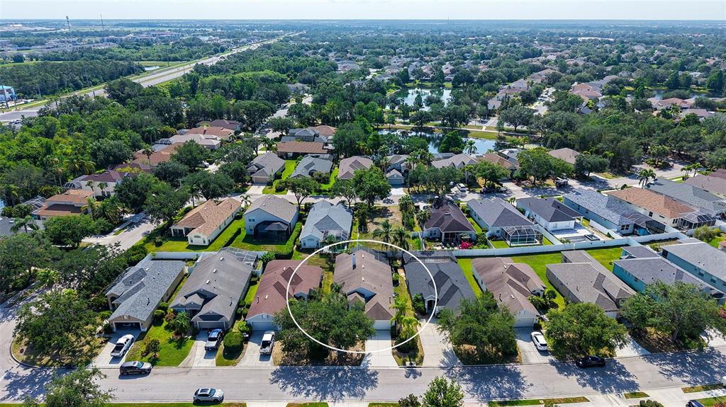 6213 Willet Court Lakewood Ranch, FL 34202 - Photo 39 of 74 an aerial view of a city with lots of residential buildings