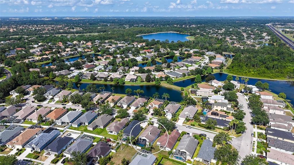 6213 Willet Court Lakewood Ranch, FL 34202 - Photo 43 of 74 an aerial view of residential houses with outdoor space and swimming pool