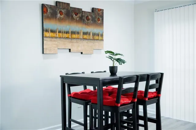 a view of a dining room with furniture