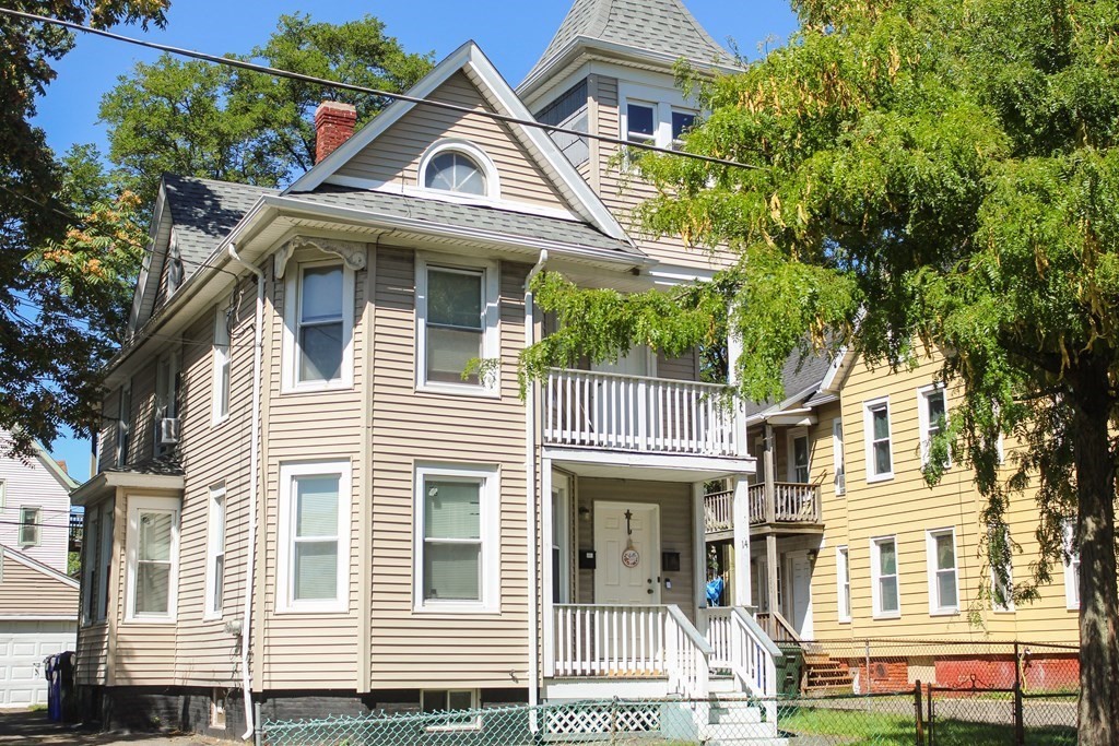 14 Cleveland Street Springfield, MA 01104 - Photo 2 of 14 a view of a white building with large windows