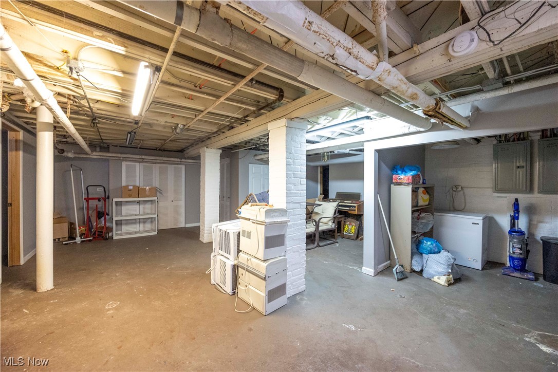2075 Coventry Road Cleveland, OH 44118 - Photo 30 of 41 Basement with electric panel and fridge