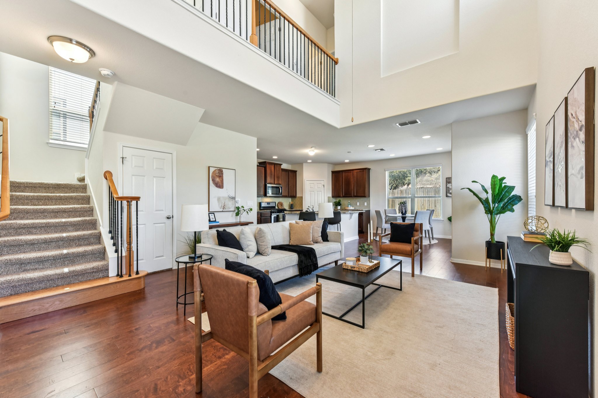 919 Boatswain Way Austin, TX 78748 - Photo 1 of 1 a living room with furniture and a wooden floor