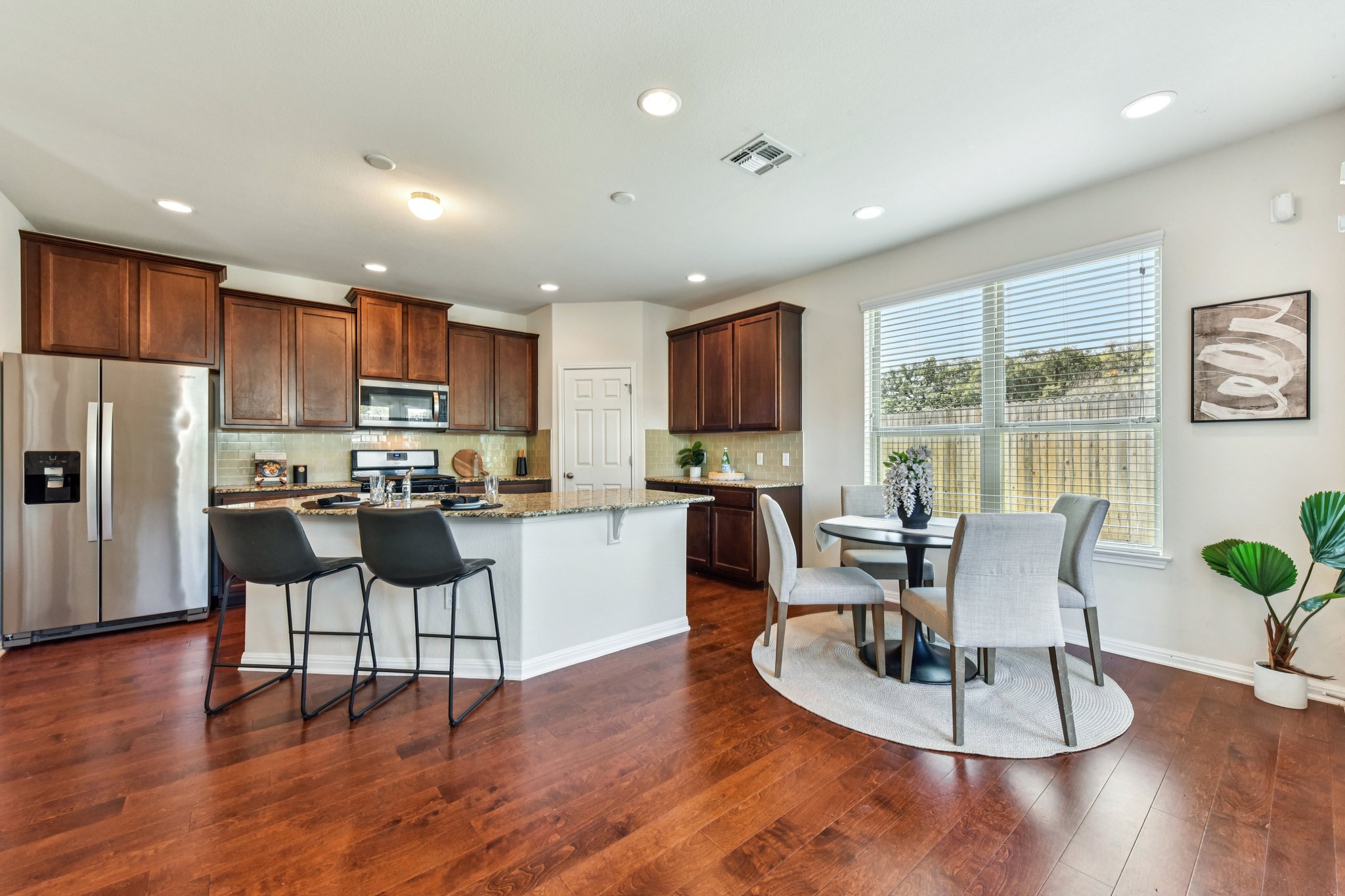 919 Boatswain Way Austin, TX 78748 - Photo 13 of 30 The breakfast nook sits right off the kitchen, perfect for family dinners.