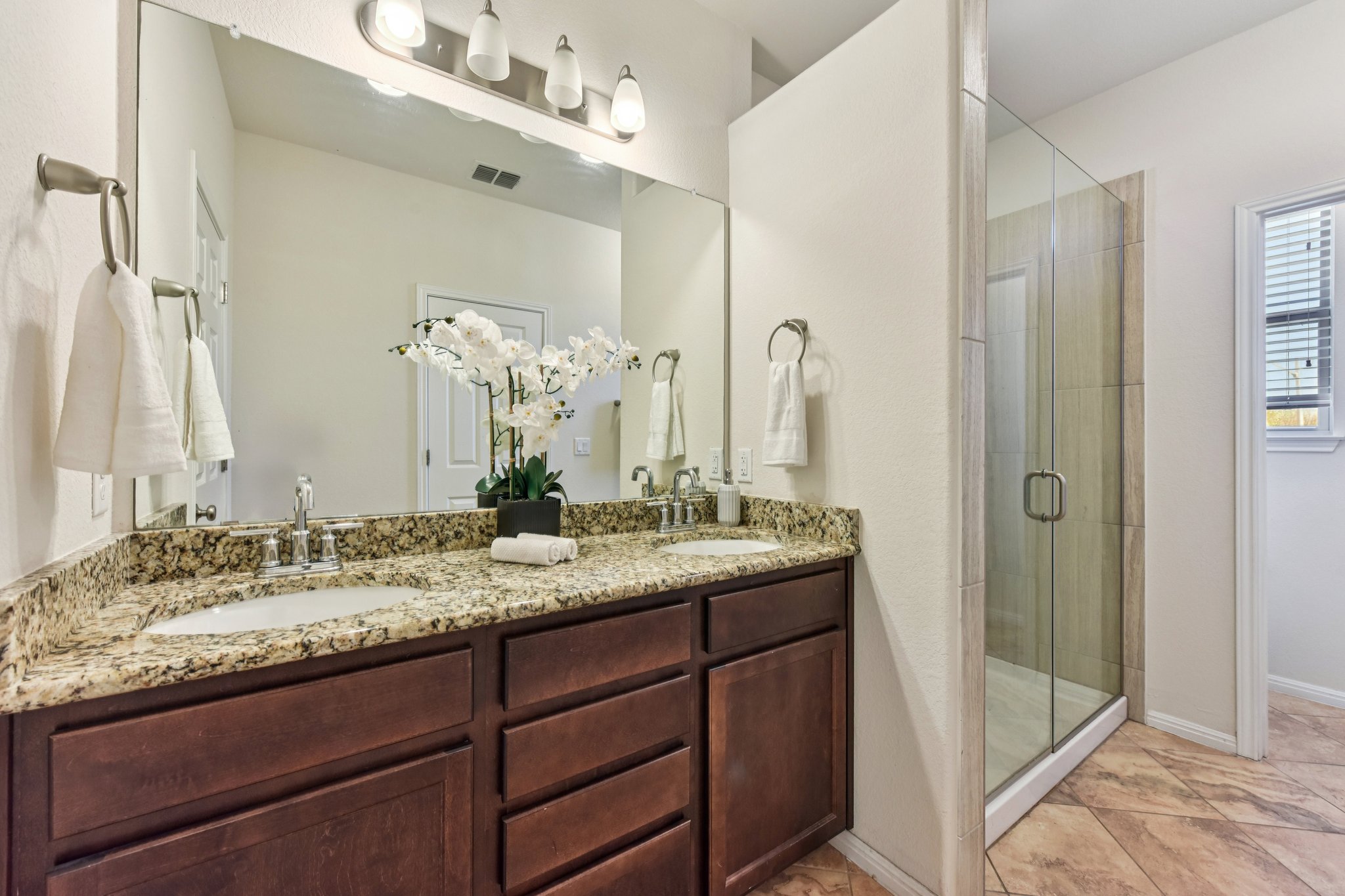 919 Boatswain Way Austin, TX 78748 - Photo 19 of 30 The primary's ensuite features a dual granite vanity. No crowding in here.