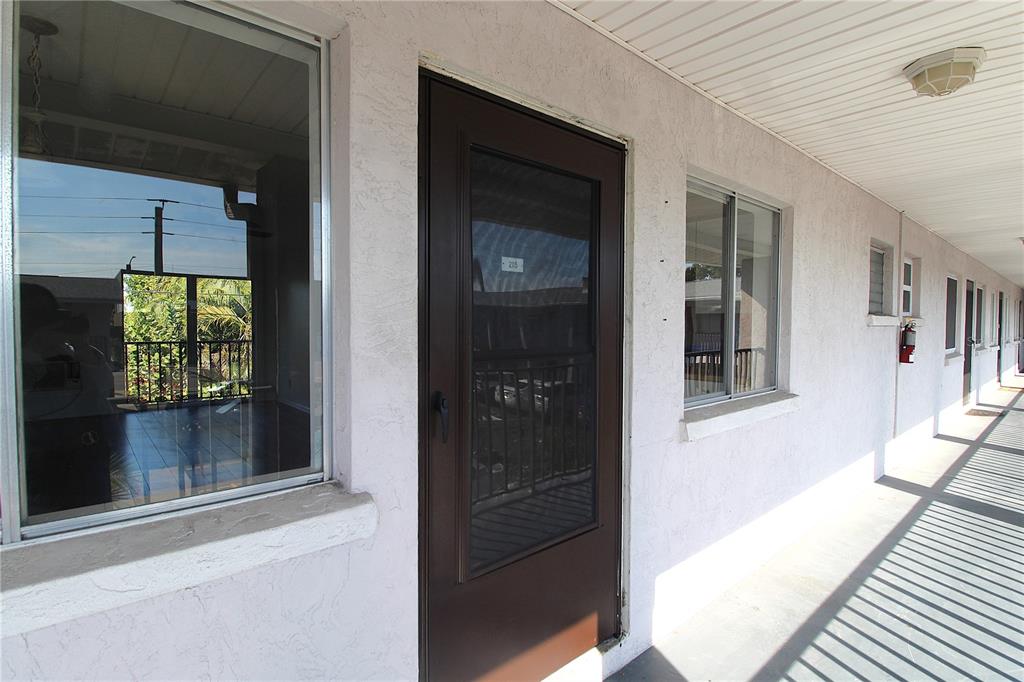 3101 Bee Ridge Road, Unit 215 Sarasota, FL 34239 - Photo 2 of 15 a view of a balcony of a house