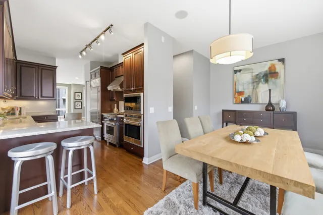 a bathroom with a sink a mirror and vanity