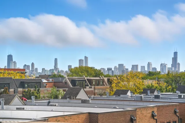 a city view with tall buildings