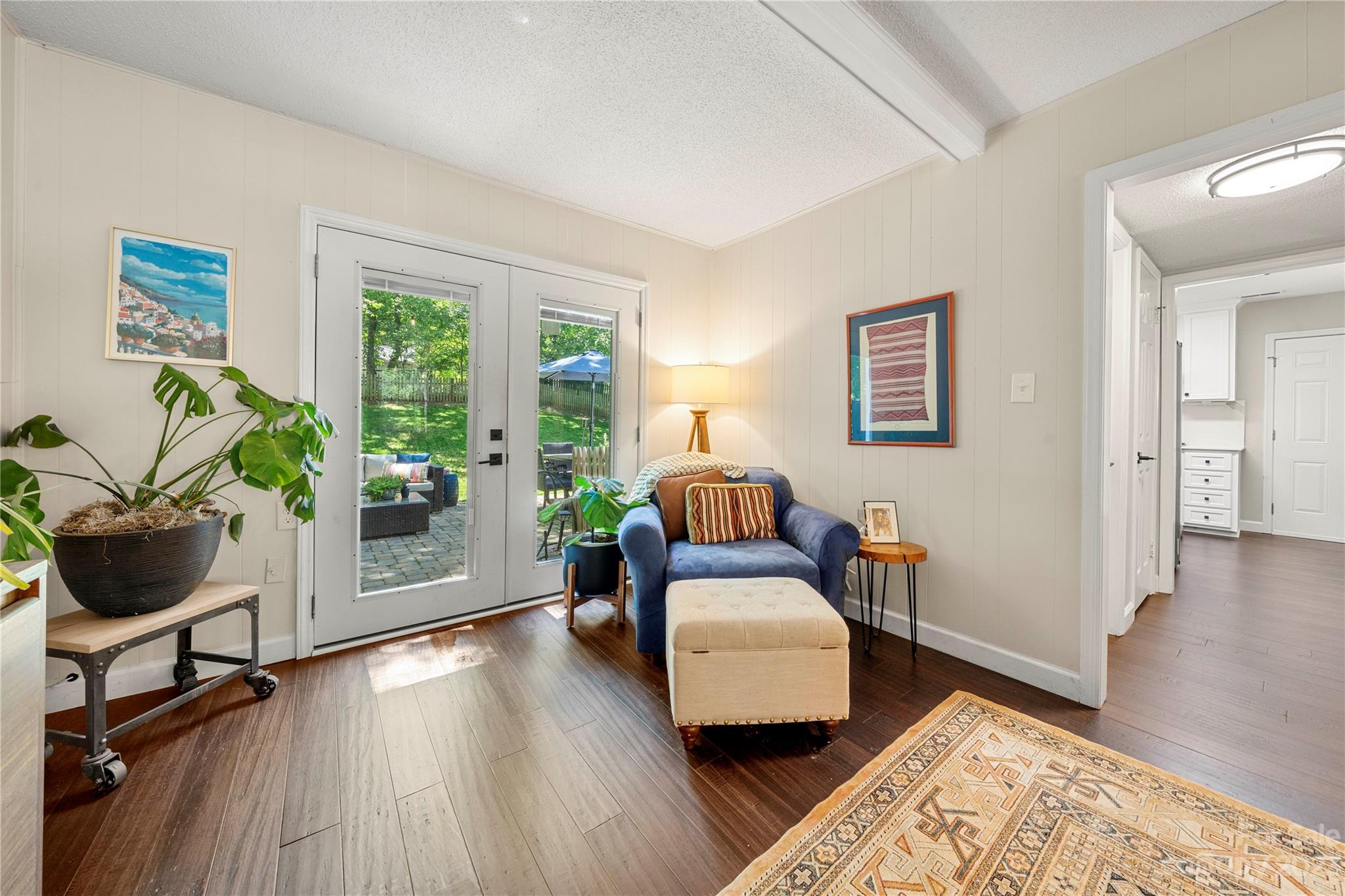 6433 Round Hill Road Charlotte, NC 28211 - Photo 12 of 33 a living room with furniture and a wooden floor