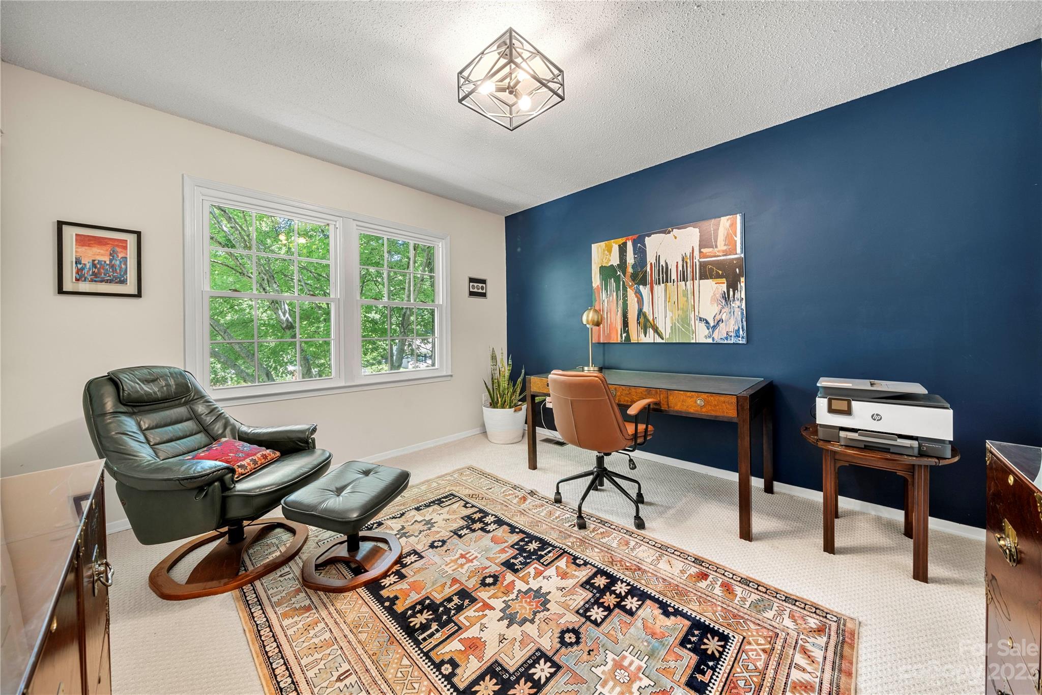 6433 Round Hill Road Charlotte, NC 28211 - Photo 20 of 33 a living room with furniture a rug and a window
