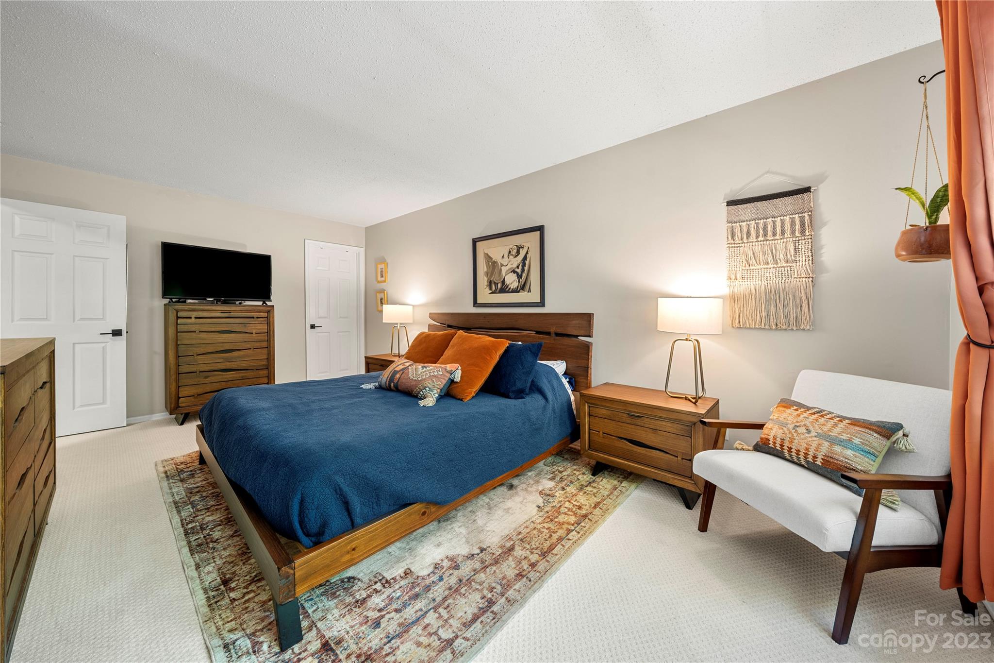 6433 Round Hill Road Charlotte, NC 28211 - Photo 25 of 33 a bedroom with a bed and a couch