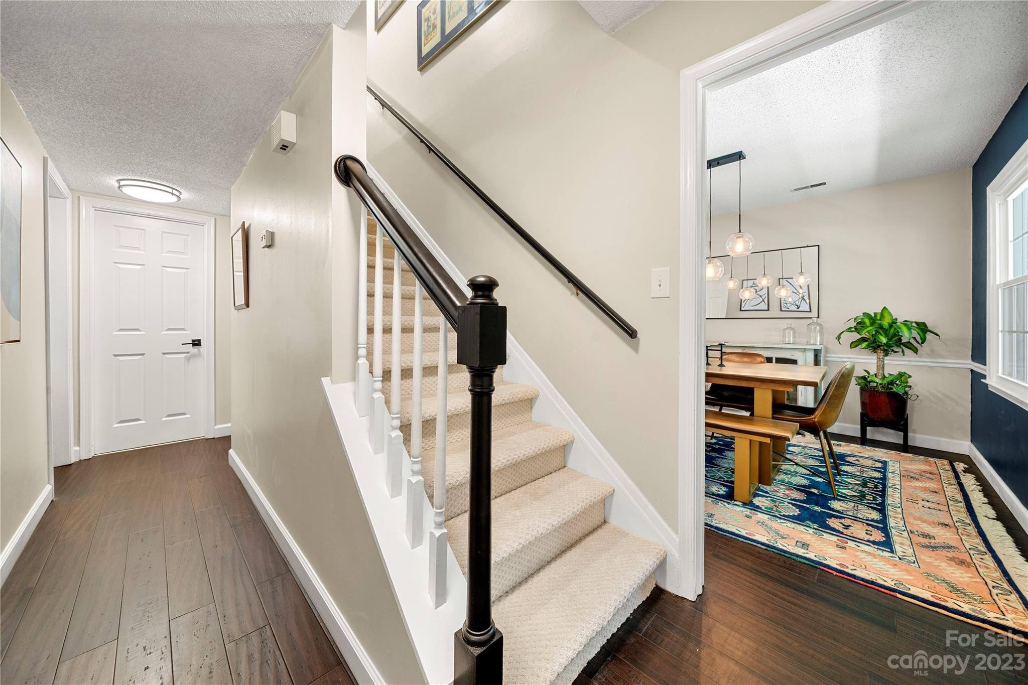 6433 Round Hill Road Charlotte, NC 28211 - Photo 7 of 33 a view of entryway and hall with wooden floor