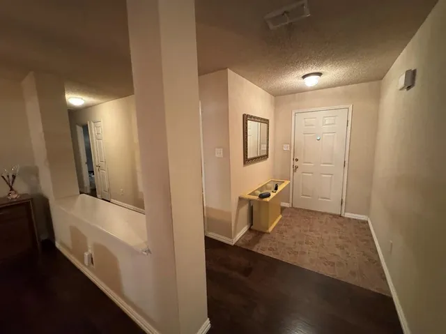a bathroom with a tub and a sink