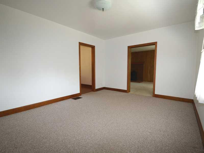 2732 McMorran Road Gibsonia, PA 15044 - Photo 3 of 22 Living Room. Living room, wall to wall carpet, refinished wood trim.