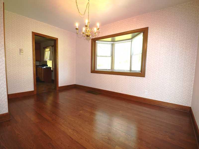 2732 McMorran Road Gibsonia, PA 15044 - Photo 4 of 22 Dining Room. Dining room with laminate floor, bay window.