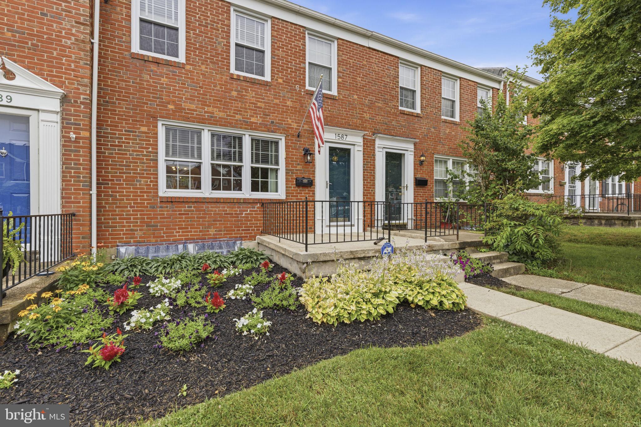 1587 Doxbury Road Towson, MD 21286 - Photo 27 of 31 Charming brick townhome with vibrant garden.