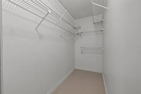 a view of a room with racks on the wall