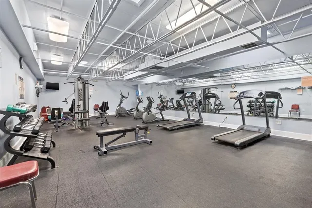 a view of a room with gym equipment