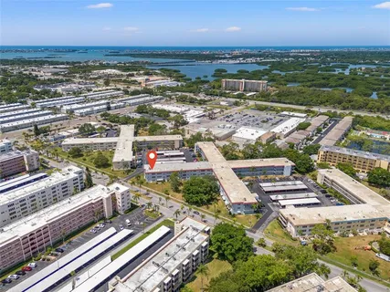a view of a city with an ocean view