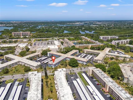 a view of a city with an ocean view